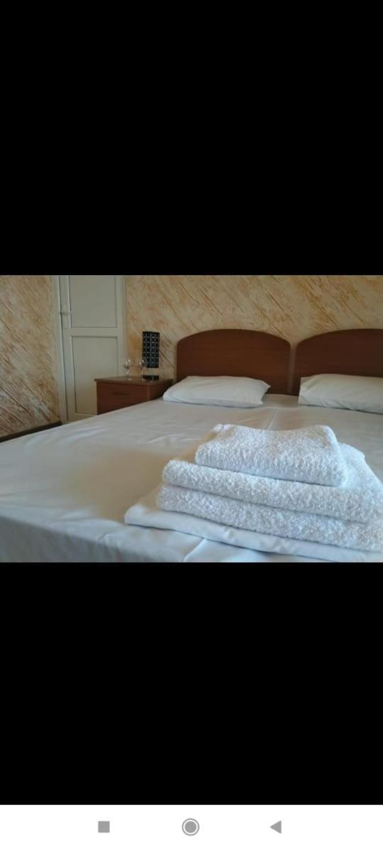Geno Guest House ควาเรียที ห้อง รูปภาพ